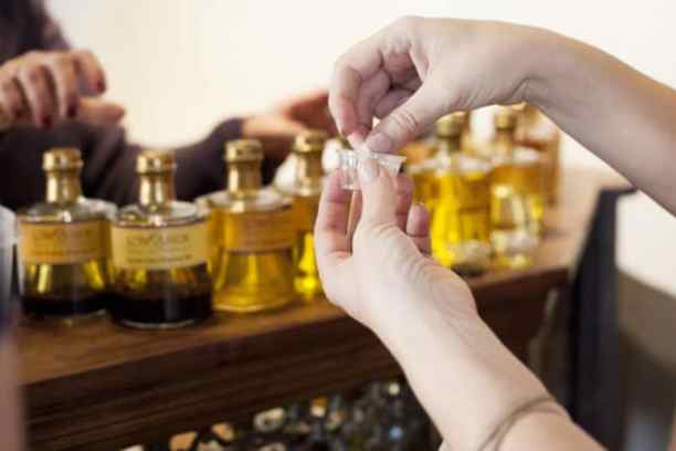 a hand holding a bottle