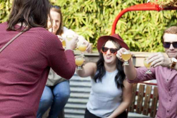 a group of people standing next to a person