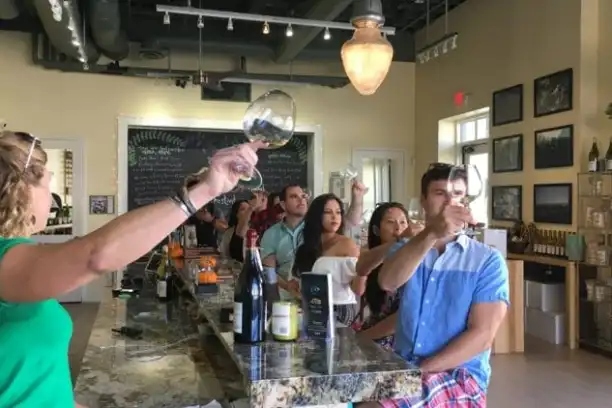 a man and a woman standing in a kitchen