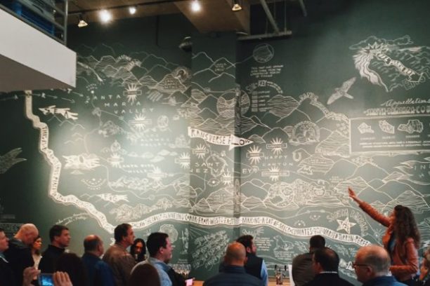 a group of people standing in front of a crowd