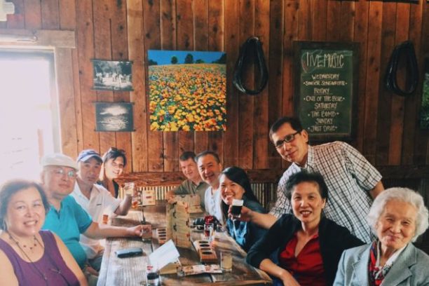 a group of people sitting at a table